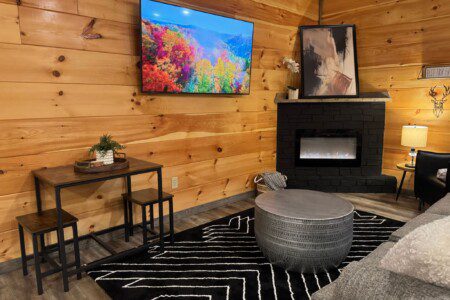 Family room with fireplace and large TV, Sevierville, TN vacation rental