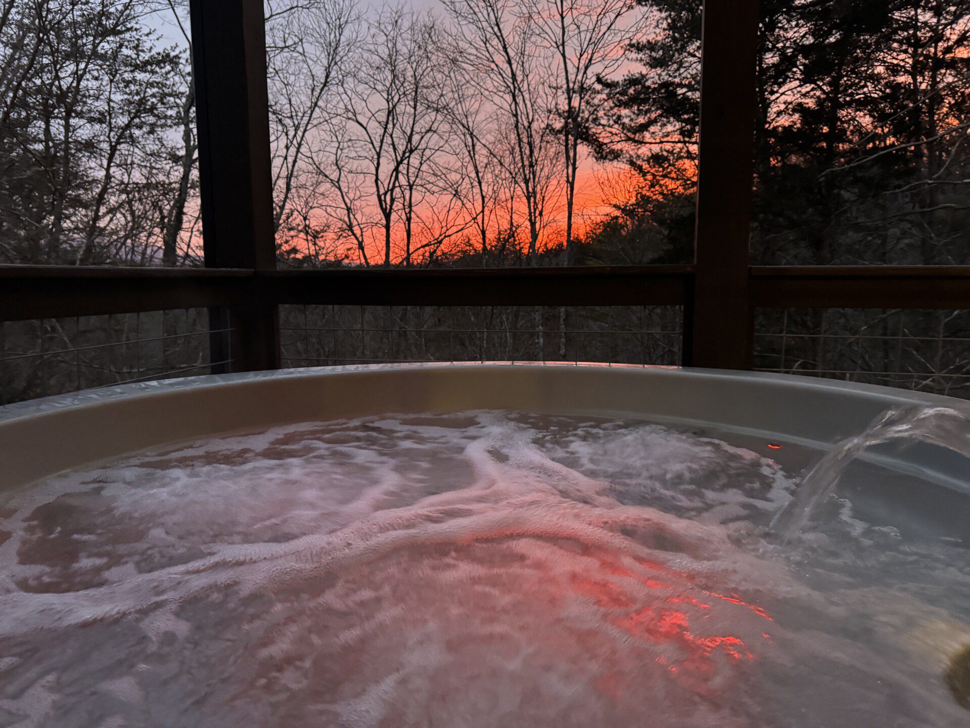 hazy hot tub pink night shot