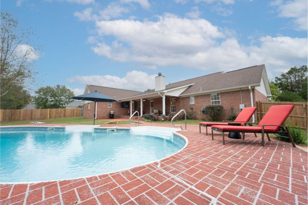 Crimson pool to full back of house